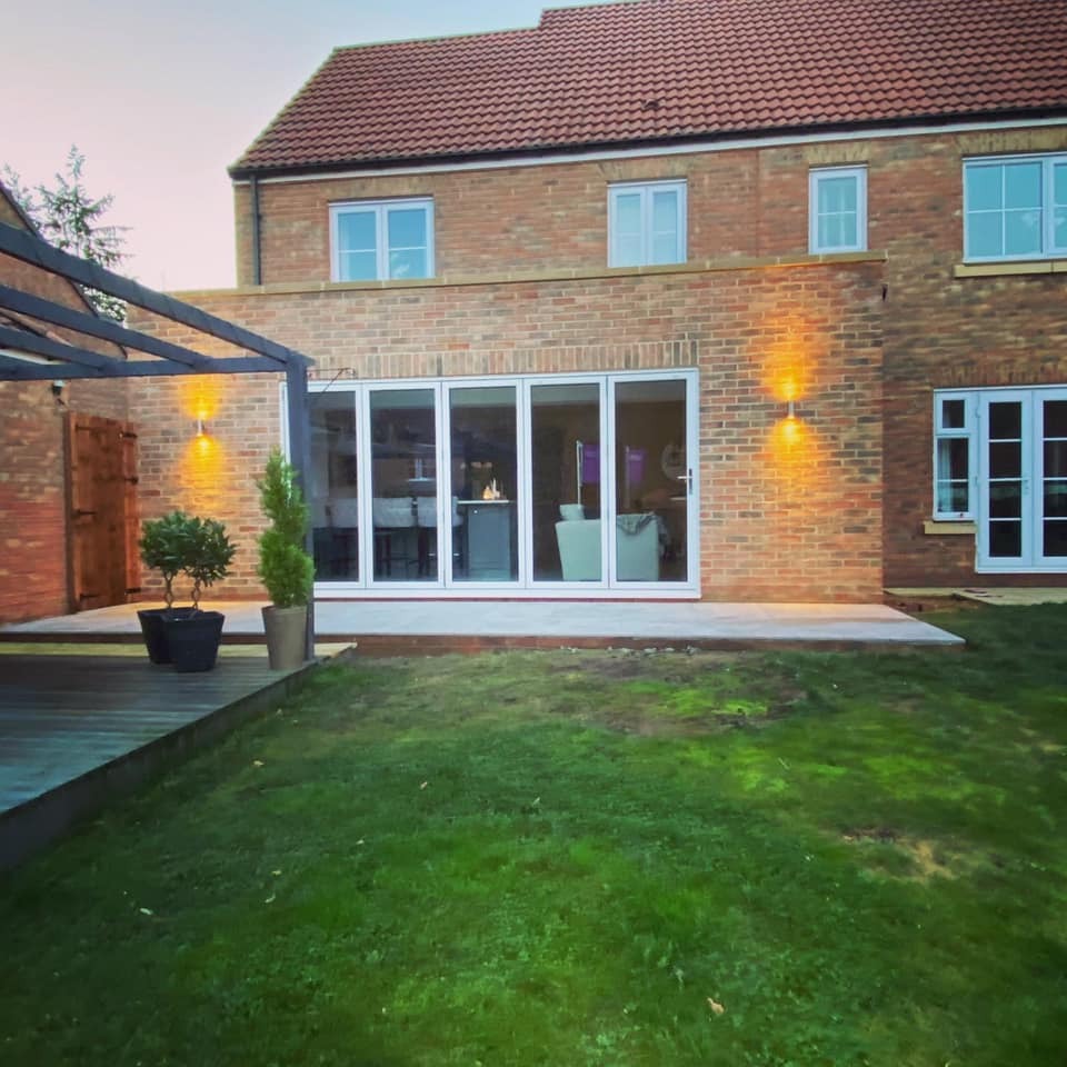 Contemporary single storey house extension with brickwork matching the original building
